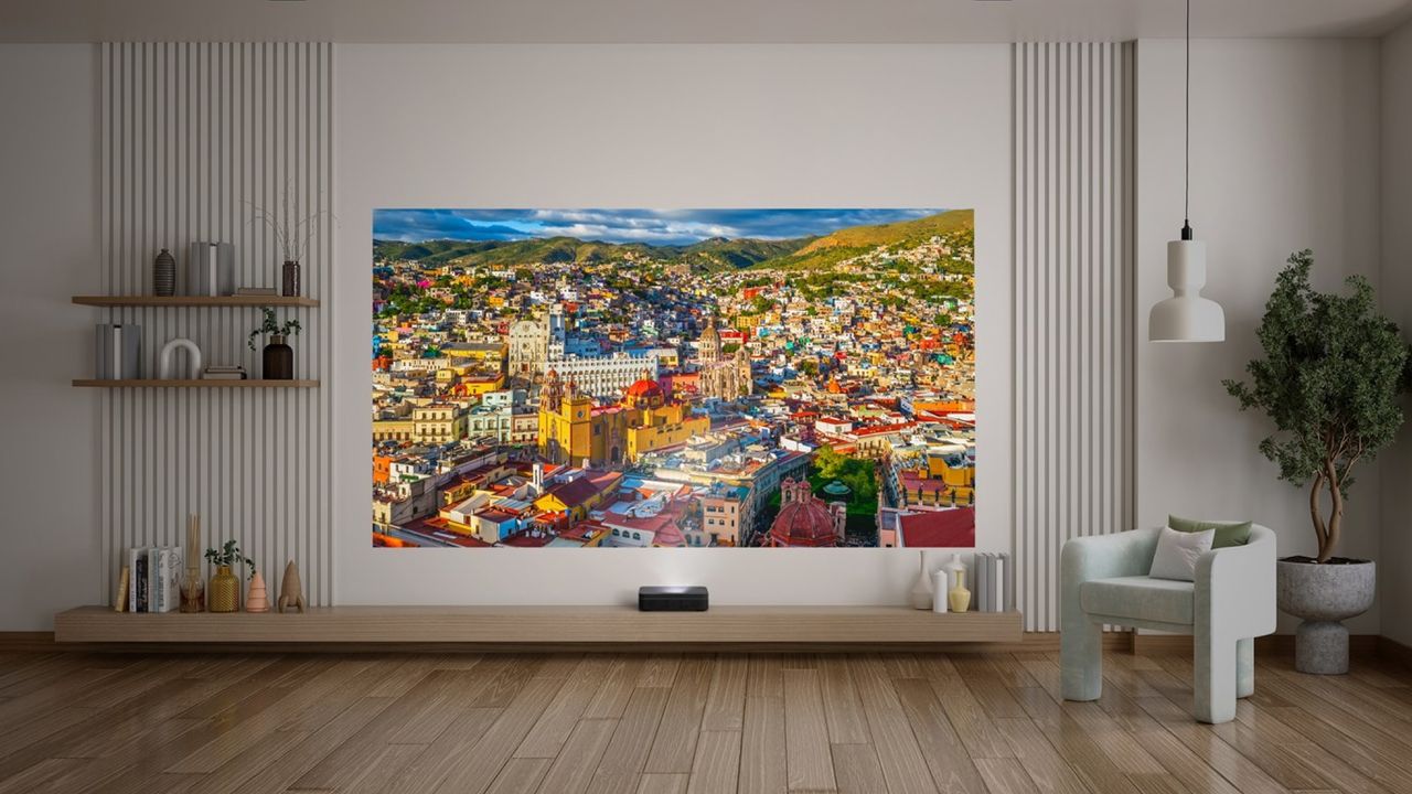 you-can-now-buy-a-mind-blowingly-small-ust-triple-laser-projector-in-the-us-–-huge,-colorful-images-from-a-tiny-box-that-sits-right-next-to-the-wall